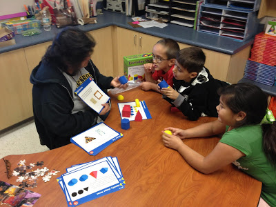 Teacher working with a small group of students.
